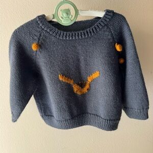 Argentinian Wool Blue Sweater with ocre hand embroidered Accents